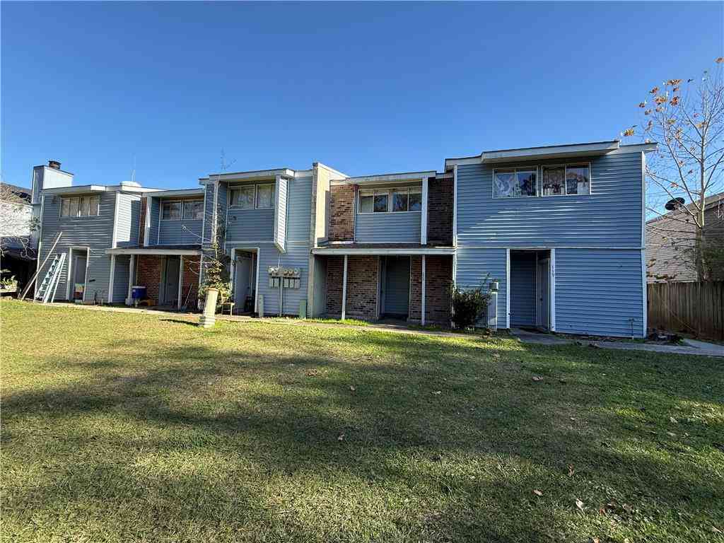 Blue fourplex in Lacombe, Louisiana